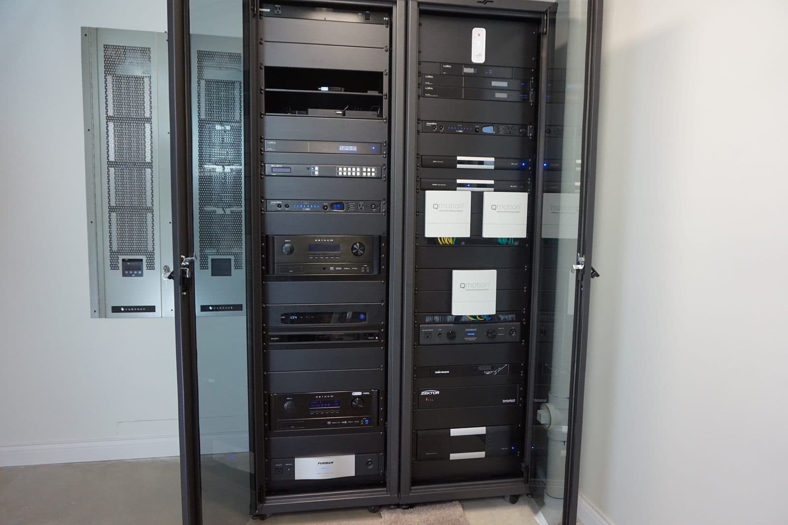 Professional home automation equipment rack with structured wiring and control systems