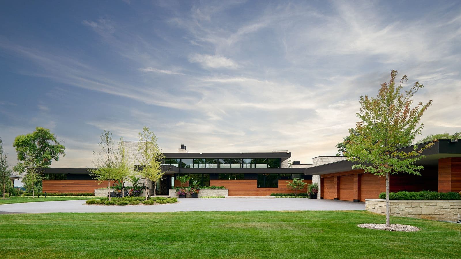 Ketra outdoor architectural lighting — luxury Twin Cities home exterior at dusk