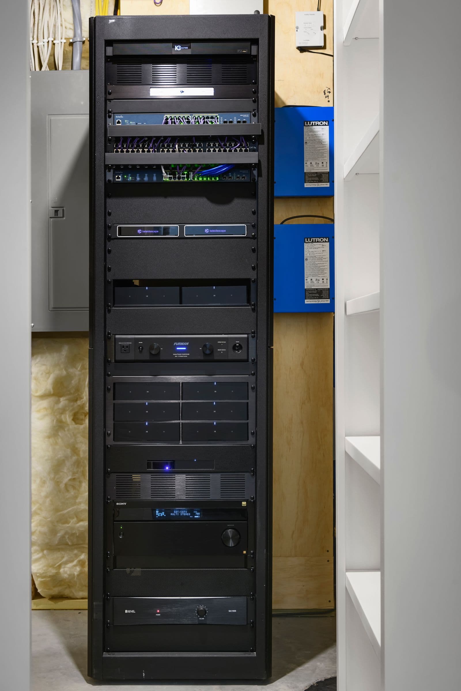 Professional AV equipment rack with Lutron automation and media servers