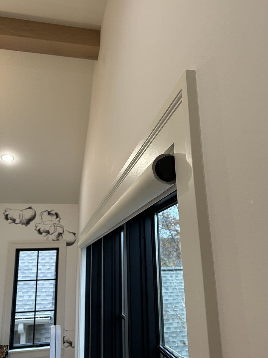 Motorized shade cassette and motor installation detail in custom millwork
